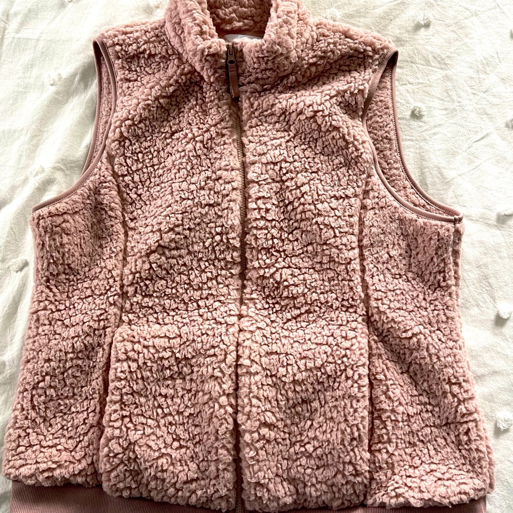 Gently used pink sweater vest. Size XL